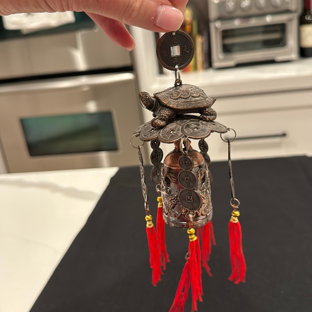 Old feng shui wind chimes stock image.
Image of turtle